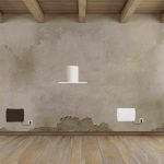 Wohnraum mit Feuchtigkeitsschäden an der Wand – Notwendigkeit für ATE- oder ATG-Geräte zur Wandtrocknung